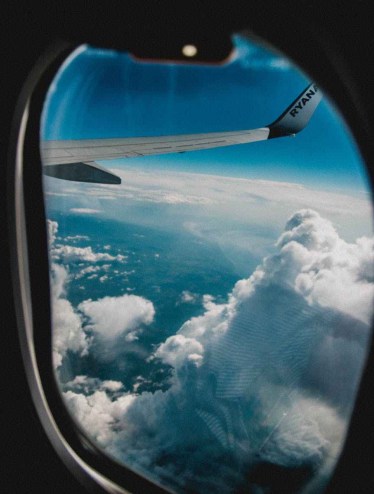 aerial photography of airplane right wing